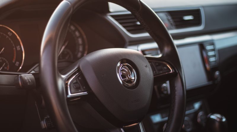 black toyota car steering wheel