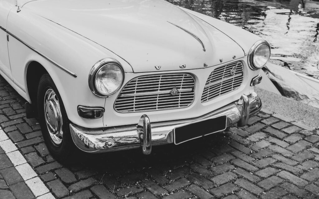 white car on brick pavement