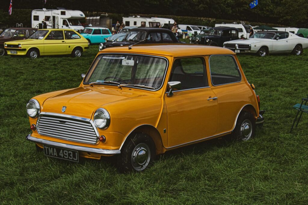 Vintage Car Rally and Campers in Green Field
