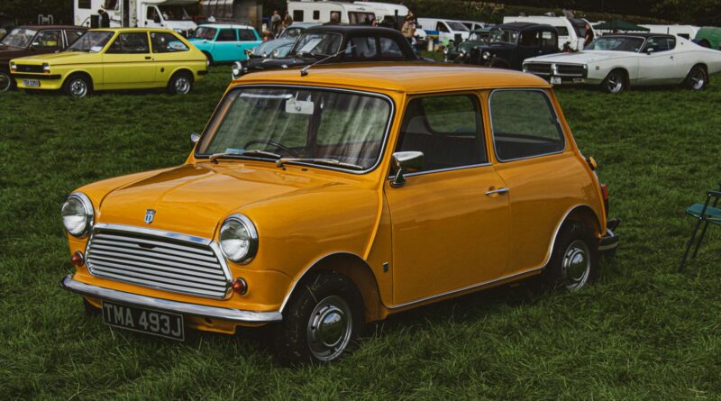 Vintage Car Rally and Campers in Green Field