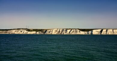 blue sea under blue sky